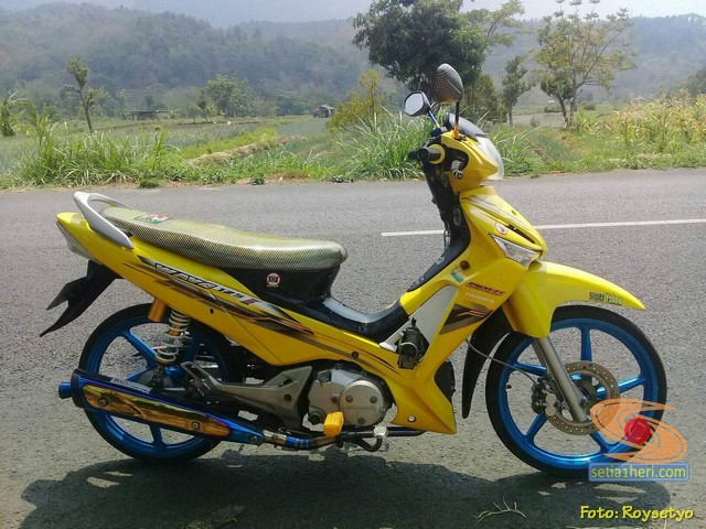 Modifikasi Honda Supra X 125 warna kuning brosis