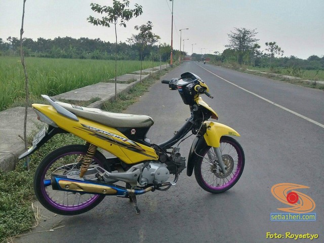 Modifikasi Honda Supra X 125 warna kuning brosis